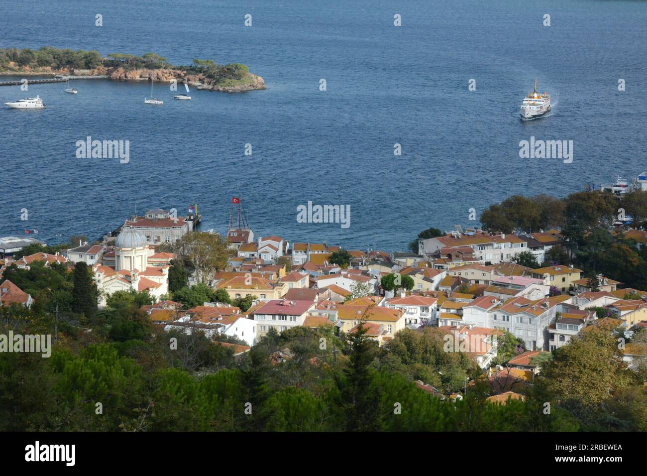 The ferry boat from Istanbul arriving at the island of Burgazada, in ...