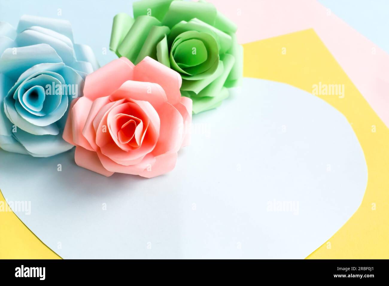 Handmade roses from pastel tone paper with copy space Stock Photo - Alamy