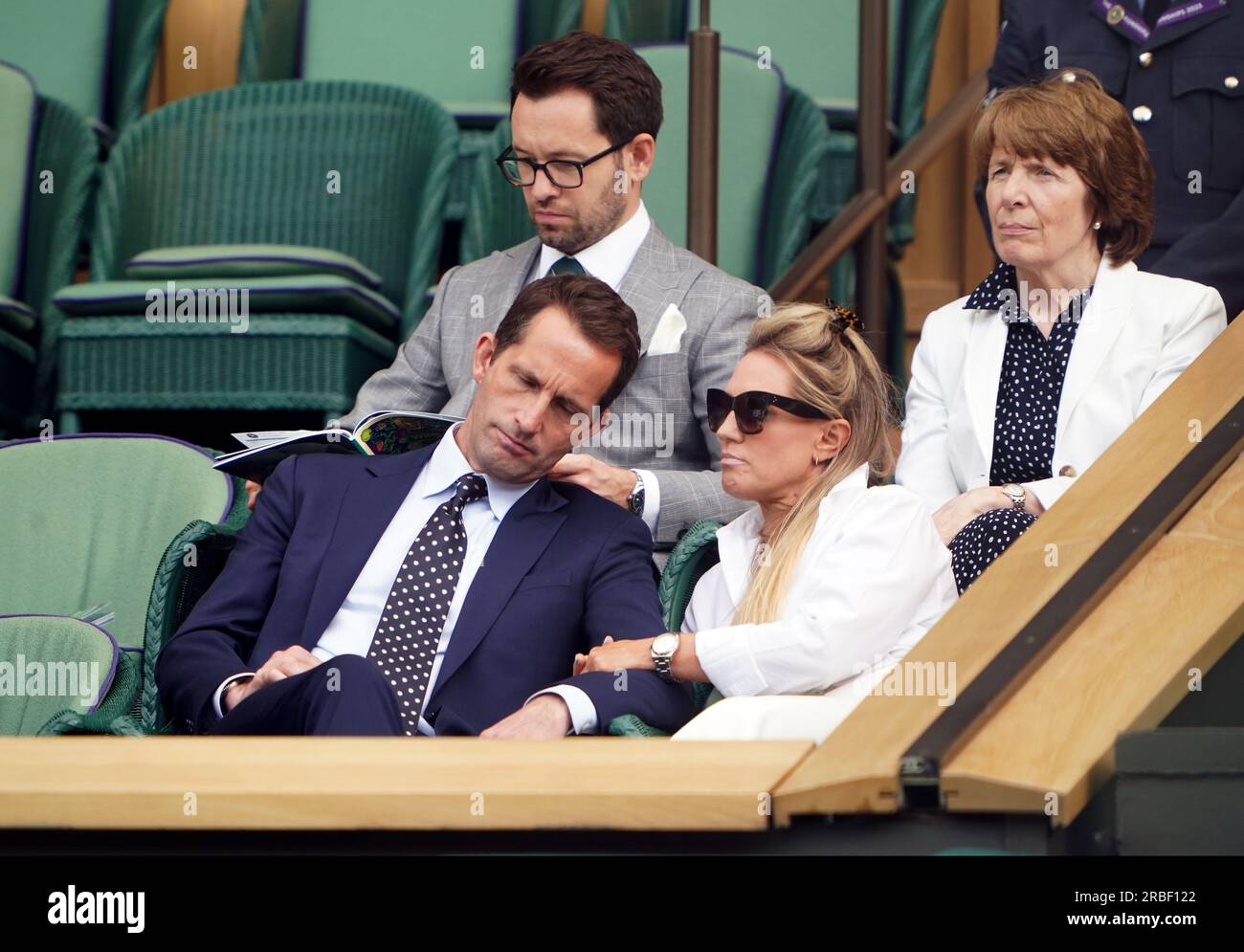 Sir Ben Ainslie and Georgie Thompson in the royal box of centre court