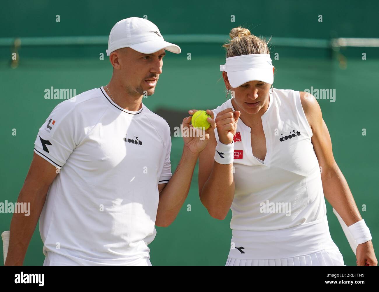 Jan Zielinski (left) and Nicole Melichar-Martinez during their mixed doubles match against Jamie Murray and Taylor Townsend(not pictured) on day seven of the 2023 Wimbledon Championships at the All England Lawn Tennis and Croquet Club in Wimbledon. Picture date: Sunday July 9, 2023. Stock Photo