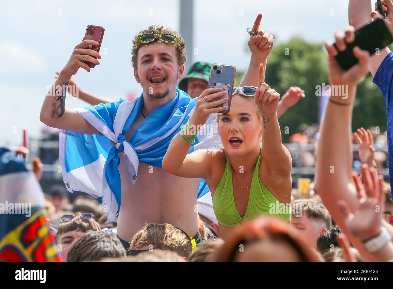 Glasgow, UK. 09th July, 2023. Music fans enjoy the sunny weather at TRNSMT music festival, Glasgow Green, Glasgow, UK. This annual festival has attracted a full attendance of 50,000 fans on the final day. Credit: Findlay/Alamy Live News Stock Photo