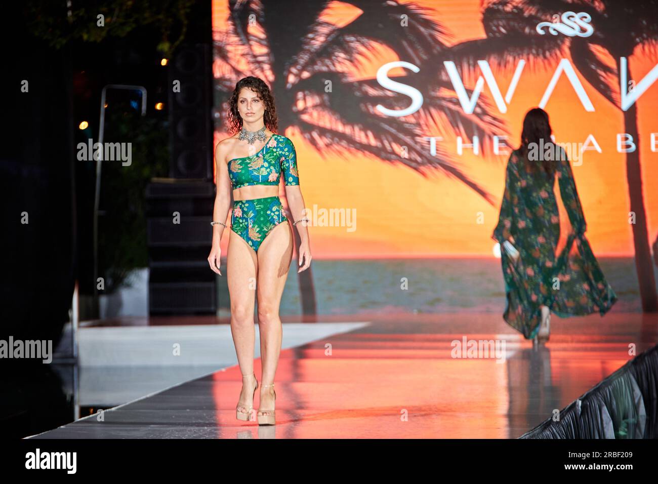 Miami Beach, USA. 09th July, 2023. MIAMI BEACH, FLORIDA - A model walks the runway for the Miami Swim Fashion Show presented by SWANA The Label during Miami Swim Week at SLS Hotel on July 08, 2023. Credit: Yaroslav Sabitov/YES Market Media/Alamy Live News. Stock Photo