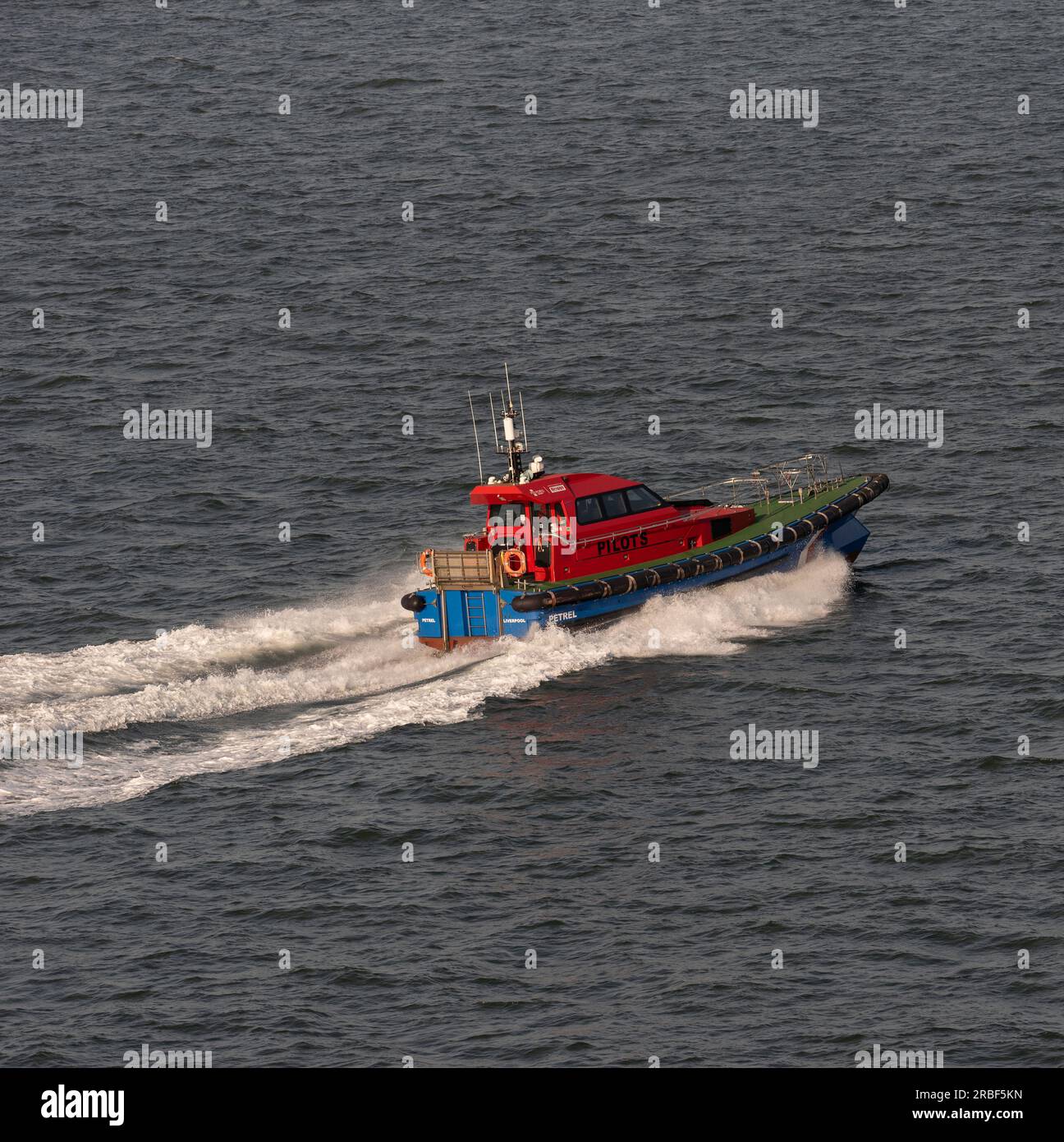 Liverpool, England, UK.  8 June 2023. Pilot boat Petrel underway at high speed over deep water on River Mersey. Stock Photo