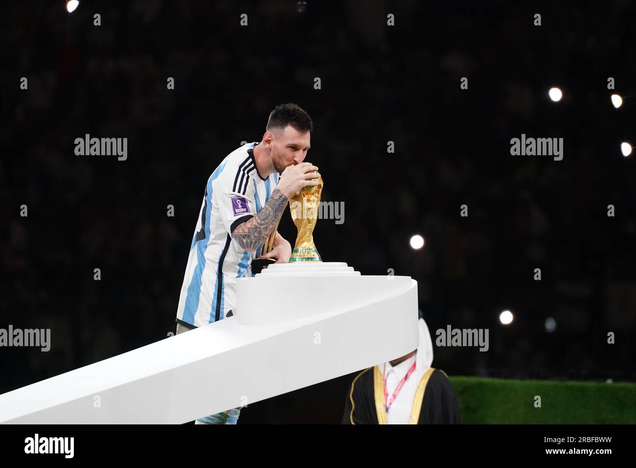 Lusail, Qatar, 18th. December 2022. Lionel Messi with the Golden Ball kiss the Trophy of the Fifa World Cup. Argentina vs. France, Match 64, Final mat Stock Photo