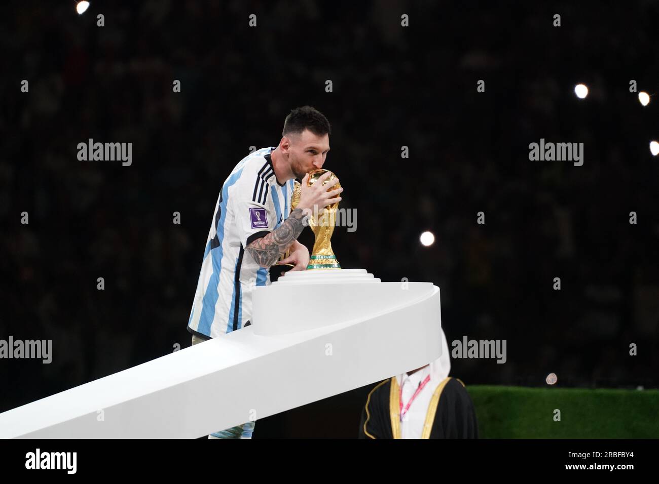 Lusail, Qatar, 18th. December 2022. Lionel Messi with the Golden Ball kiss the Trophy of the Fifa World Cup. Argentina vs. France, Match 64, Final mat Stock Photo