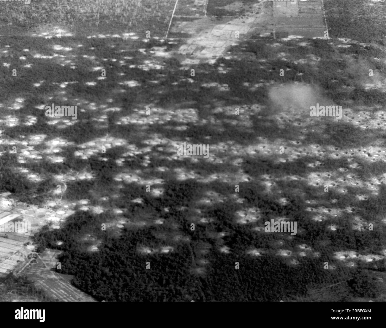 Vietnam: February 22, 1966 An area of the 'Zone D' just north of the MIchelin Rubber Plantation that has been reduced to a 'moonscape' by the precision bombing U.S. Air Force B-52 Stratofortress sorties. Stock Photo