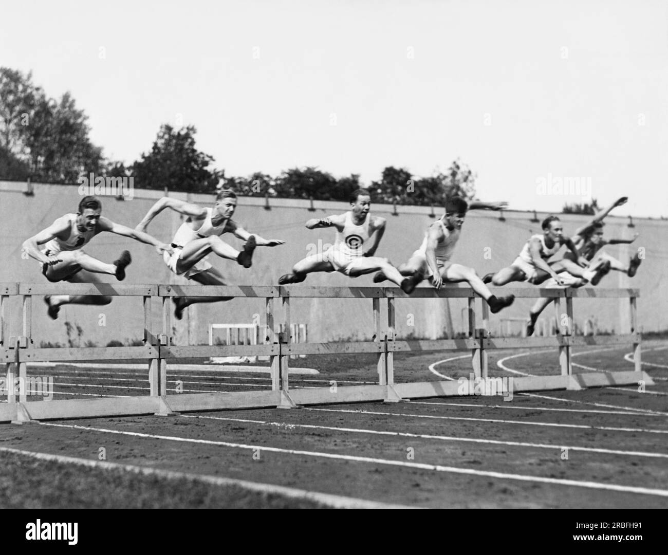 Chicago, Illinois:  August 31, 1923 The 120 yard high hurdles event at the National AAU meet at Stagg Field. Stock Photo