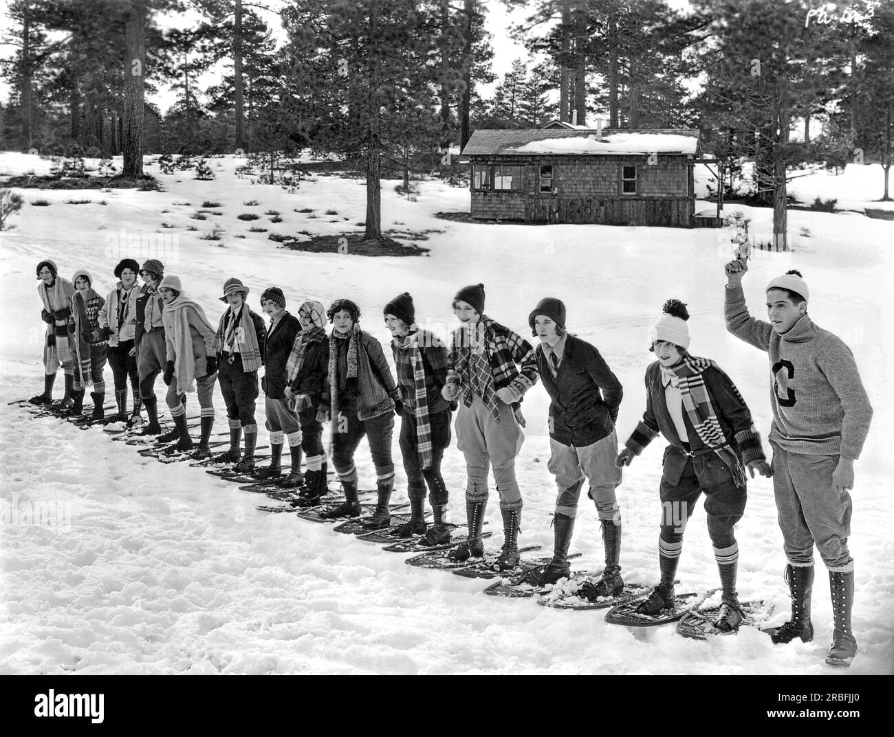 Big Bear, California:  1925. A scene from 'The Collegians' being filmed at Big Bear, California. George Lewis and Dorothy Gulliver are at the far right. Gulliver was the former 'Miss Salt Lake City'. Stock Photo