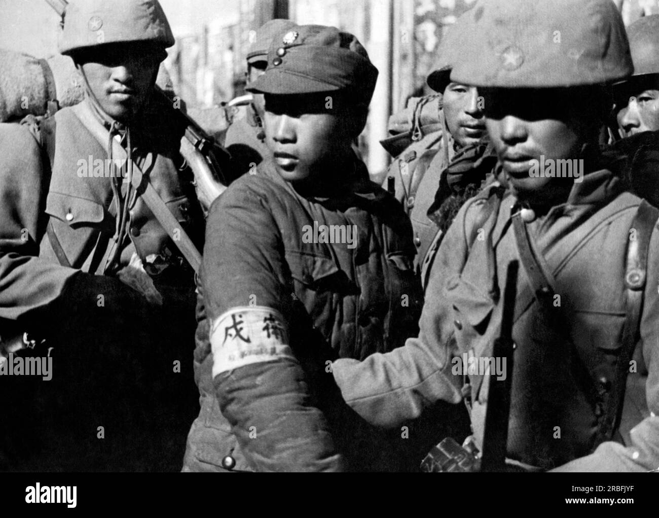 Nanking, China:  December, 1937. An official Japanese picture of a captured Chinese soldier at Nanking. With or without uniforms, thousands of Chinese soldiers at Nanking were brutally executed. Stock Photo