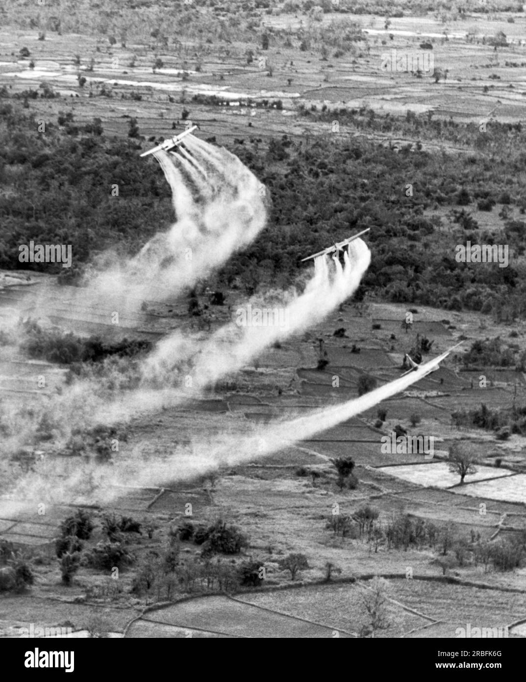 Vietnam: 1966 Three U.S. Air Force UC-123 Providers spray herbicide and ...