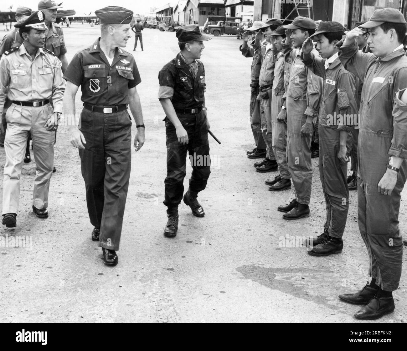 Bien Hoa, Vietnam: January 6, 1965 U.S. Air Force 3rd Tactical Fighter Wing Commander Col. Robert Ackerly escorts Republic of Vietnam Chief of State Nguyen Van Thieu on an inspection tour of the Bien Hoa Air Base. Stock Photo