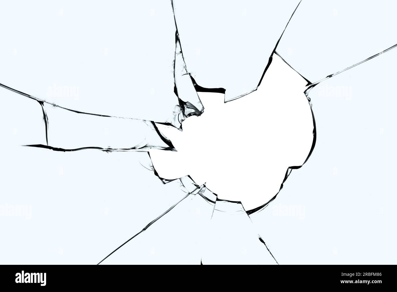 Hole and cracks on broken glass. A broken window Stock Photo Alamy