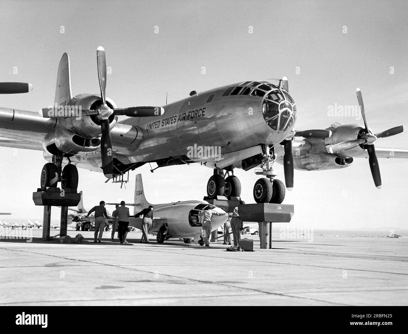 Edwards Air Force Base, California:  November 9, 1951 Bell X-1-3 being mated to the B-50 mothership for a captive flight test.  While being de-fueled after this flight it exploded, destroying itself and the B-50, and seriously burning Bell test pilot Joe Cannon. The X-1-3 had completed only a single glide-flight on July 20. Stock Photo