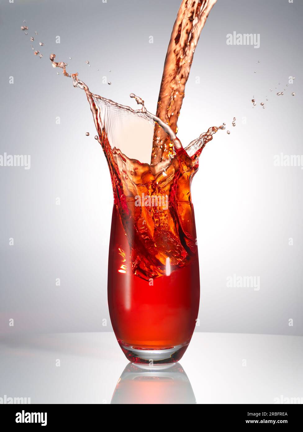 red drink splash Stock Photo Alamy