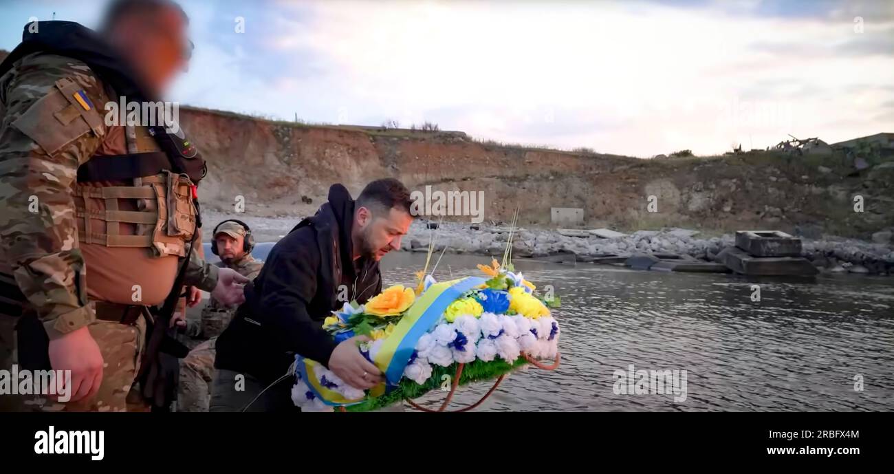 Ukraine President Volodymyr Zelensky places flowers on Snake Island commemorating the 500th day of the Russian invasion and subsequent war with Ukraine. On 24 February 2022, two Russian navy warships attacked and captured Snake Island. Defended by Ukraine's military,  on 30 June 2022, Ukraine announced that it had driven Russian forces off the island. Stock Photo