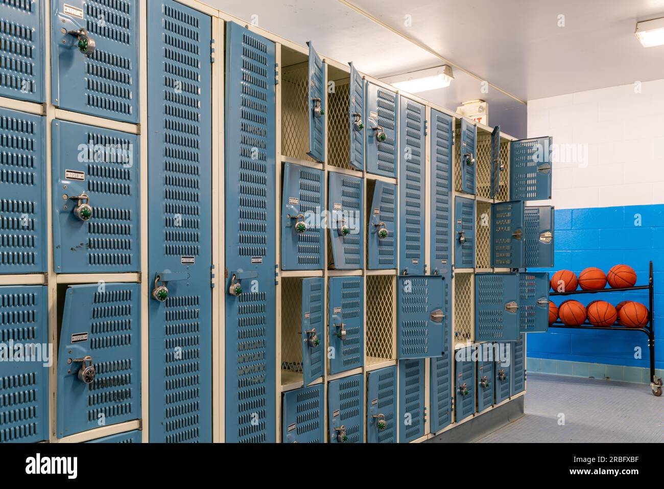 Old bent blue metal gym, gymnasium, lockers Stock Photo Alamy