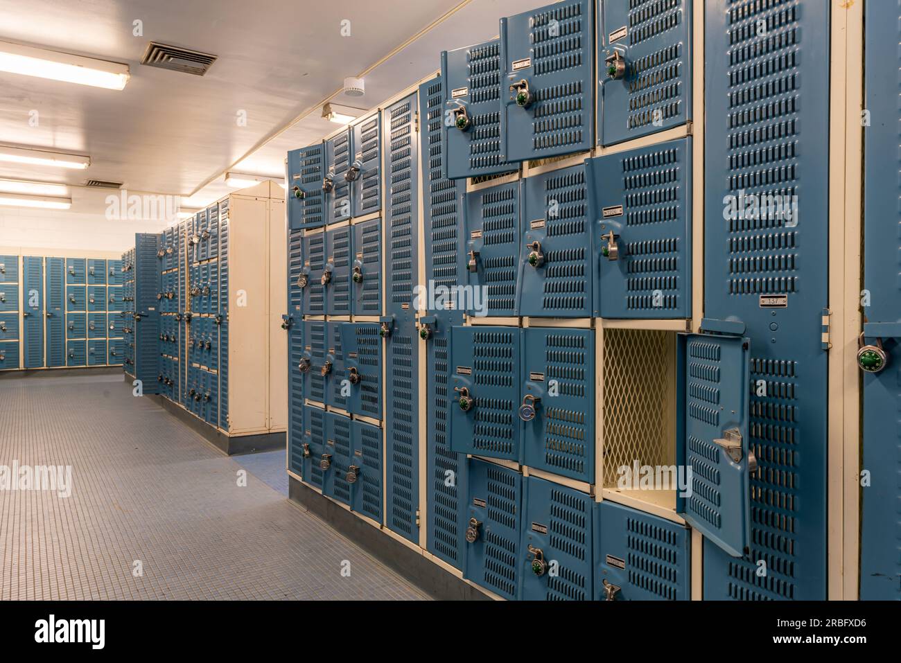Old bent blue metal gym, gymnasium, lockers Stock Photo Alamy