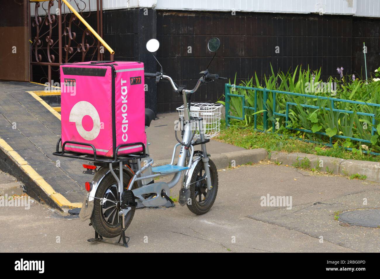 Moscow, Russia - July 9. 2023. Scooter with a Samokat bag - food and ...