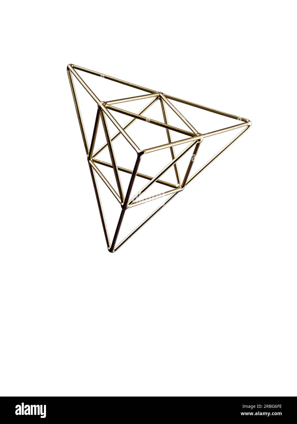 Golden triangular pyramid isolated on white background, Trigonometric representation of a volume Stock Photo