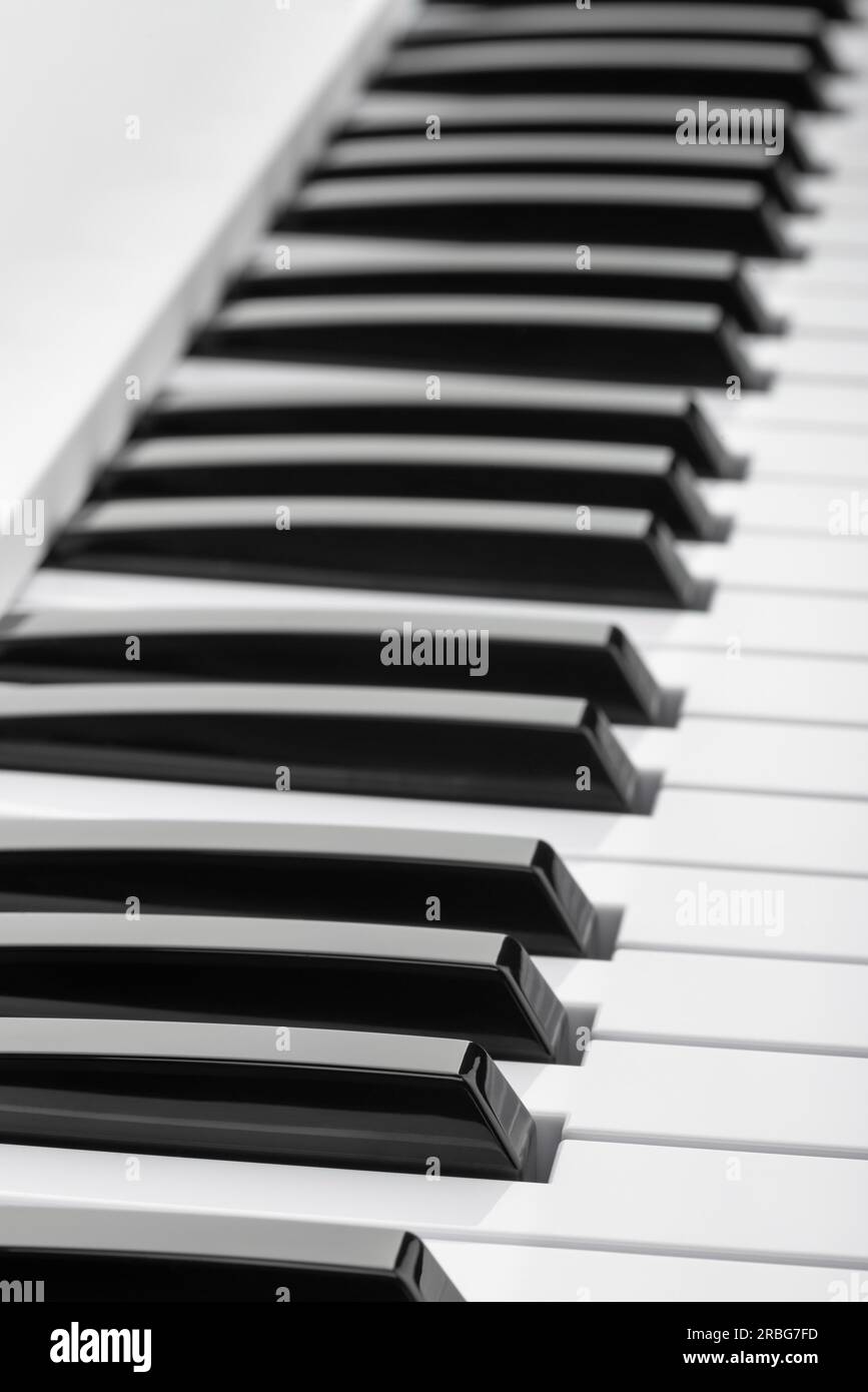 Close up detail on the black and white keys of a music keyboard, with copy space for text Stock Photo