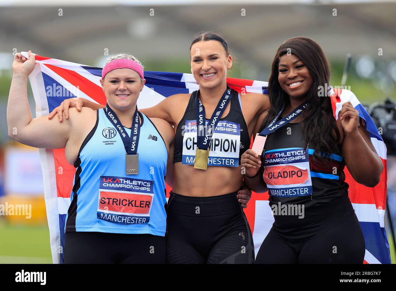 Adele Nicoll with her gold medal for winning the women’s shot put with Amelia Stickler and Divine Oladipo during the UK Athletics Championships at Manchester Regional Arena, Manchester, United Kingdom, 9th July 2023  (Photo by Conor Molloy/News Images) Stock Photo