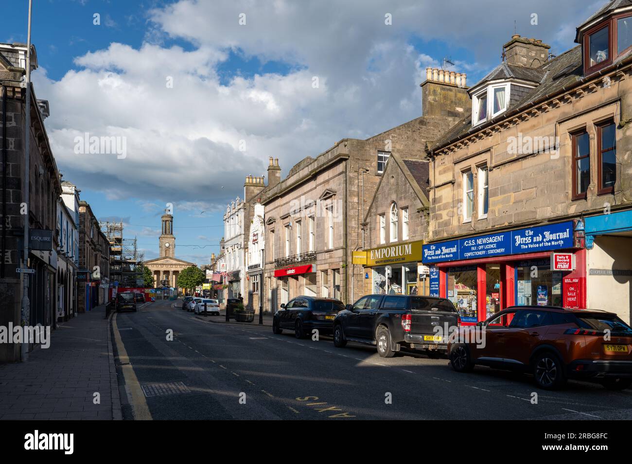 9 July 2023.High street,Elgin,Moray,Scotland. This is a view looking east along the High Street on a sunny summers evenining. Stock Photo