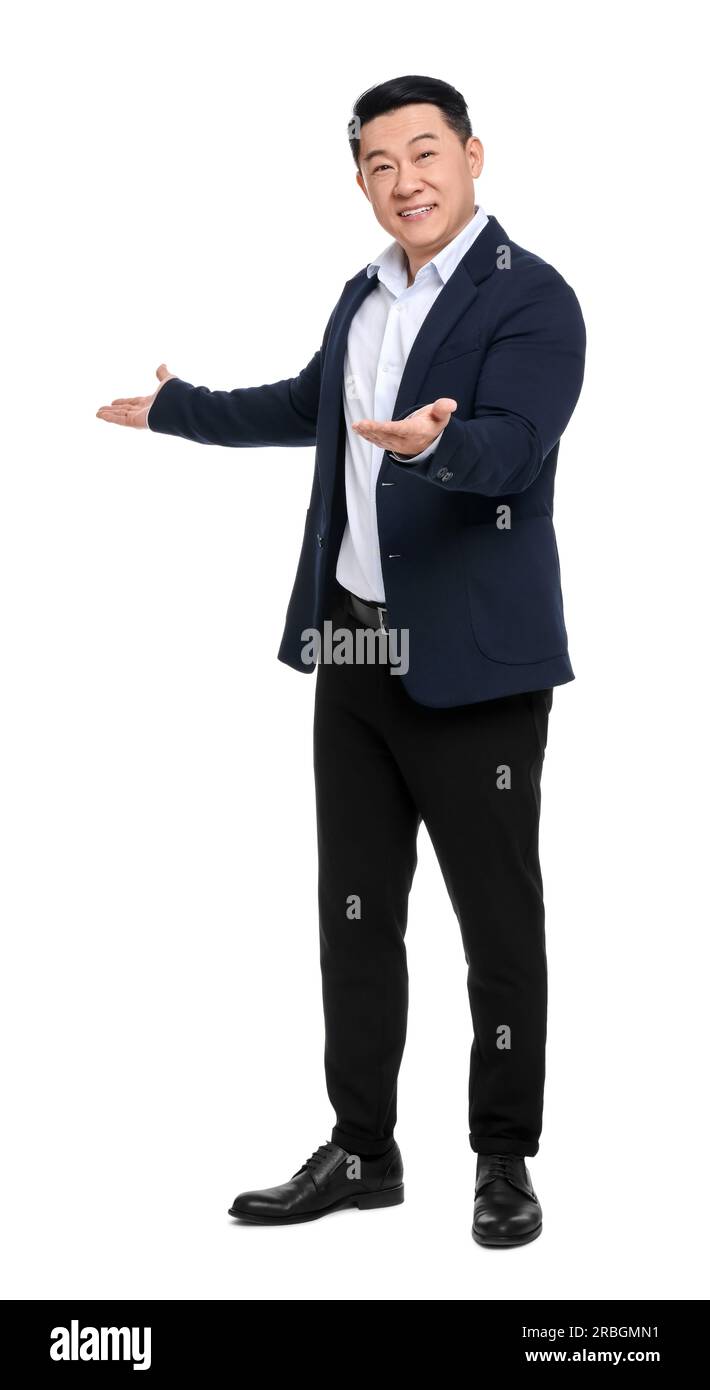 Businessman in suit posing on white background Stock Photo - Alamy