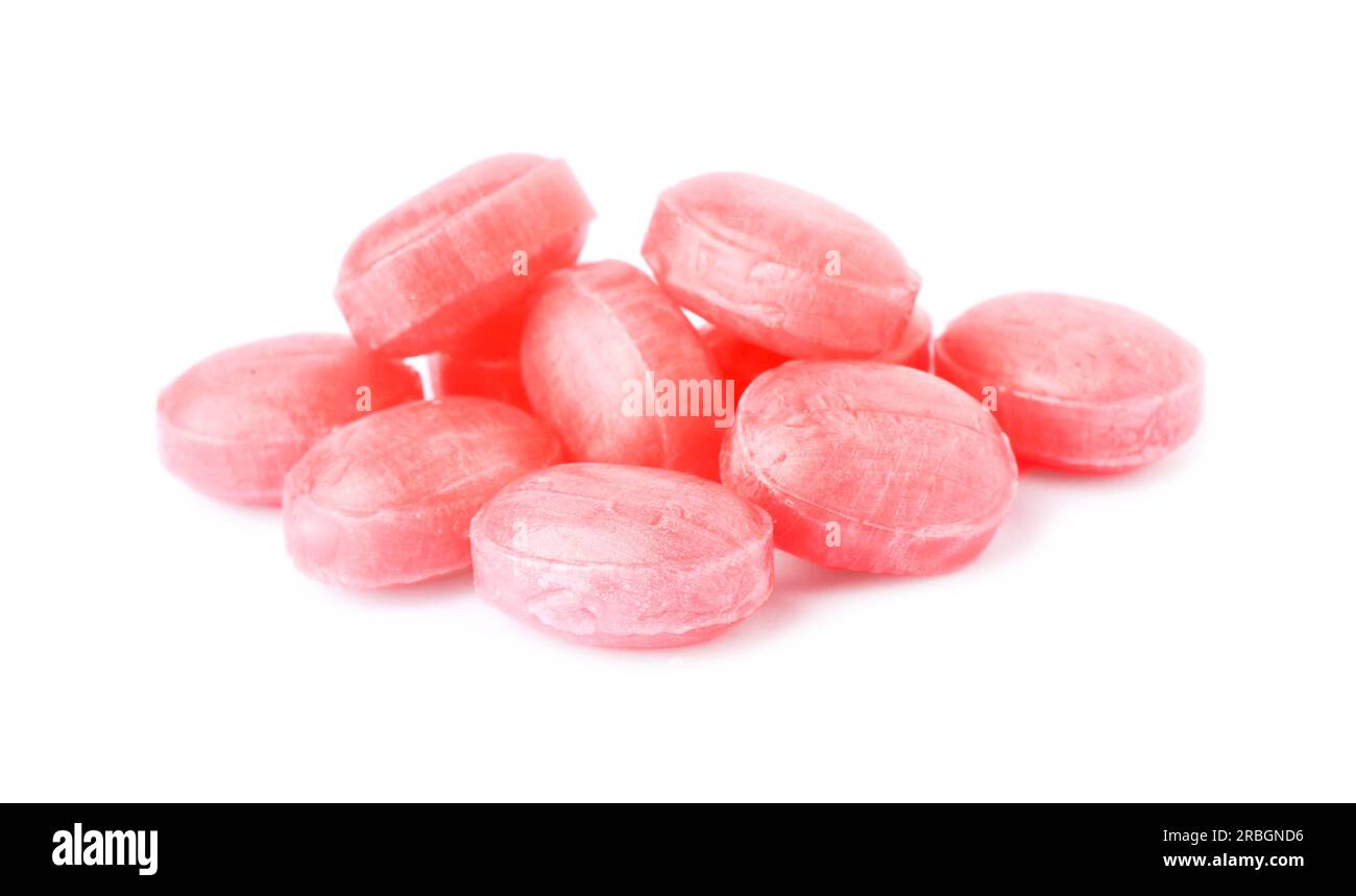 Many pink cough drops on white background Stock Photo Alamy