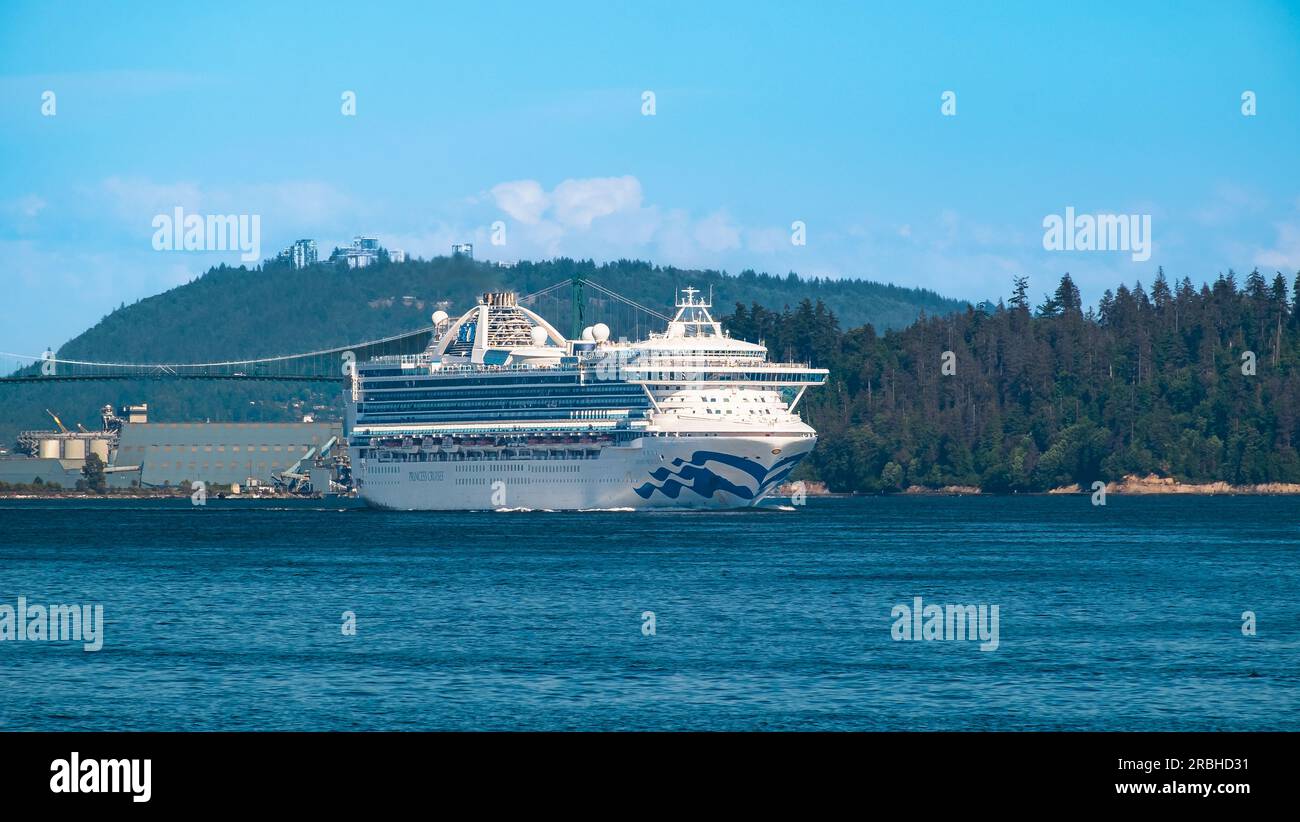 Luxury cruise ship sailing out of vancouver. Large cruise liner in blue