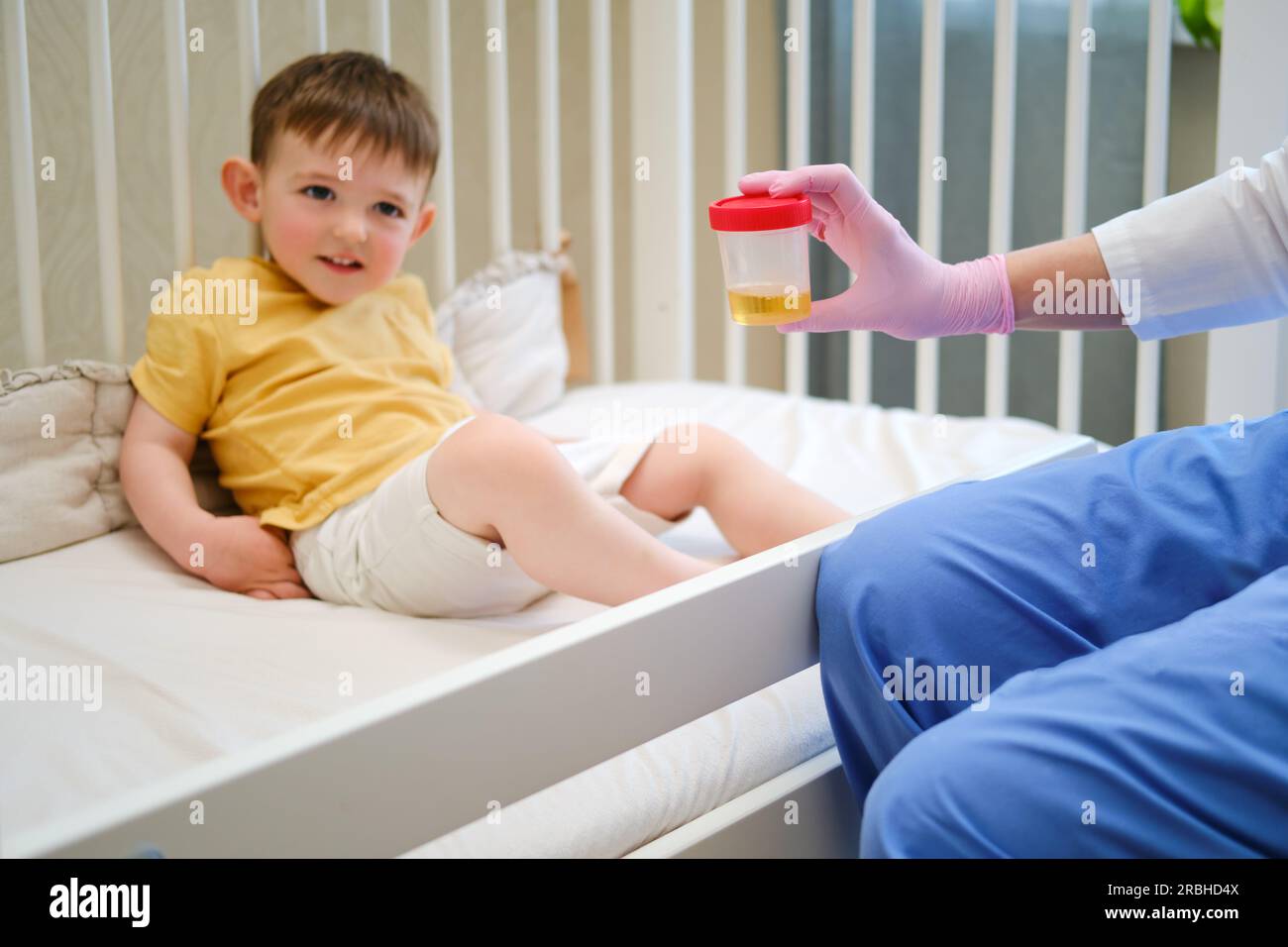 The pediatrician instructed on how to collect a urine sample at home from her sick baby for