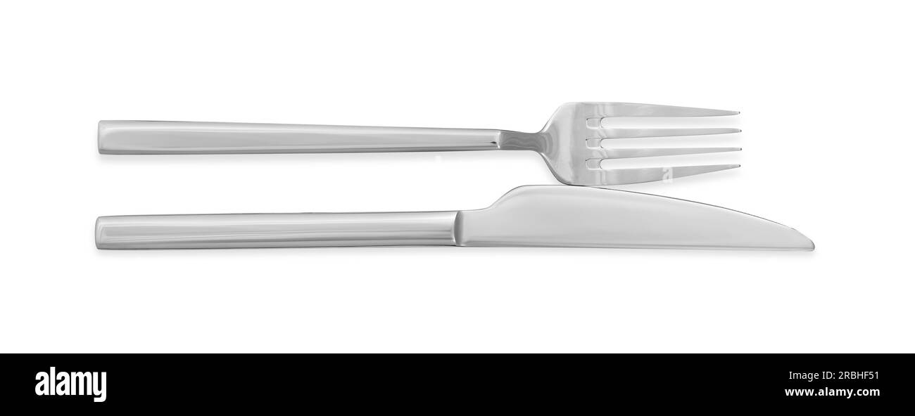 Knife and fork isolated on white, top view. Stylish shiny cutlery set ...