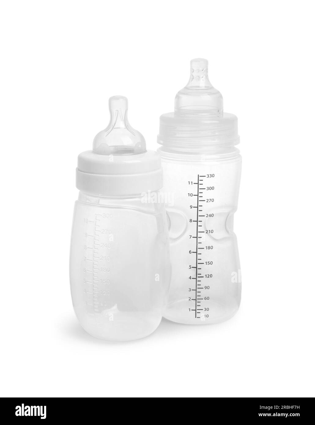 Two empty feeding bottles for infant formula on white background Stock ...