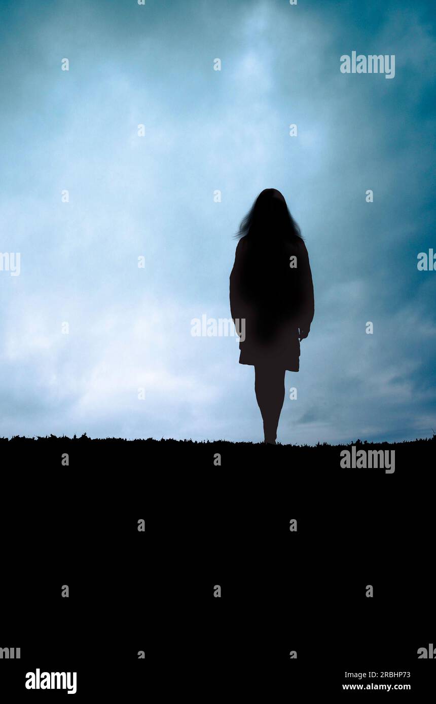 woman silhouette standing on the edge of a cliff Stock Photo - Alamy
