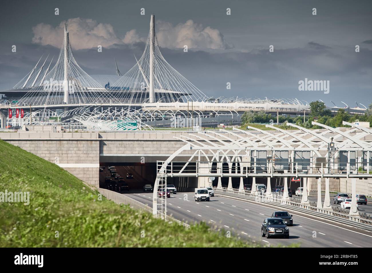 Russia, St.Petersburg, 07 July 2023: Expressway of the western high-speed diameter in clear sunny weather, green lawns along the road, new colourful Stock Photo