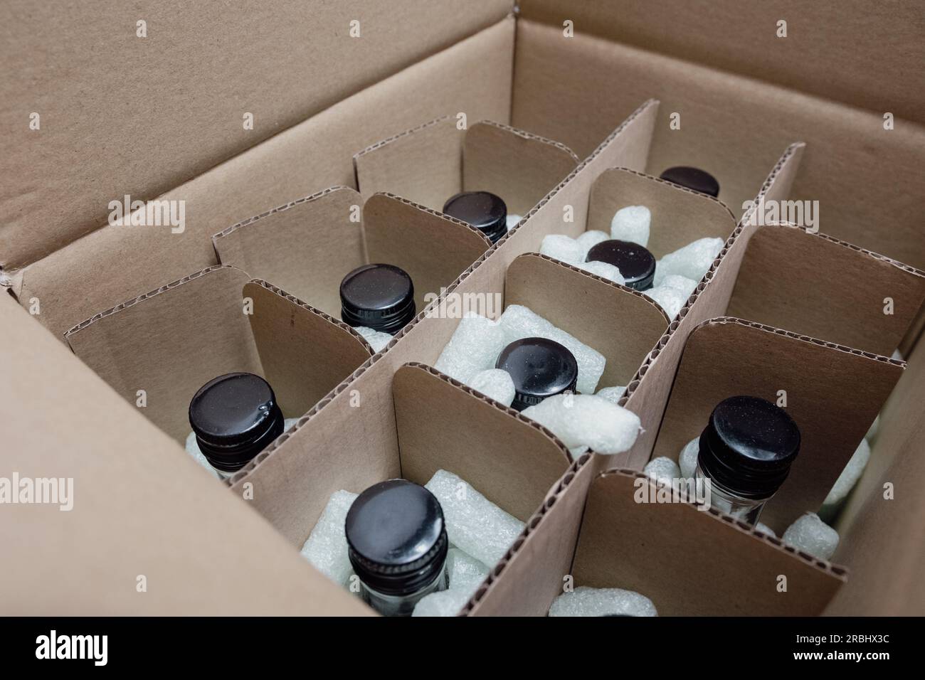 Carton with glass bottles for shipping Stock Photo Alamy