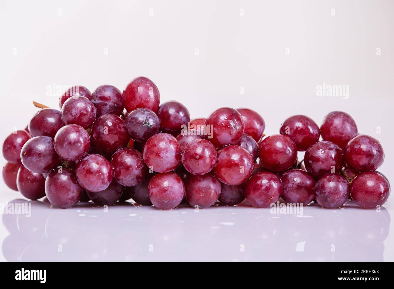 Red Green Grapes On White Background Stock Photo