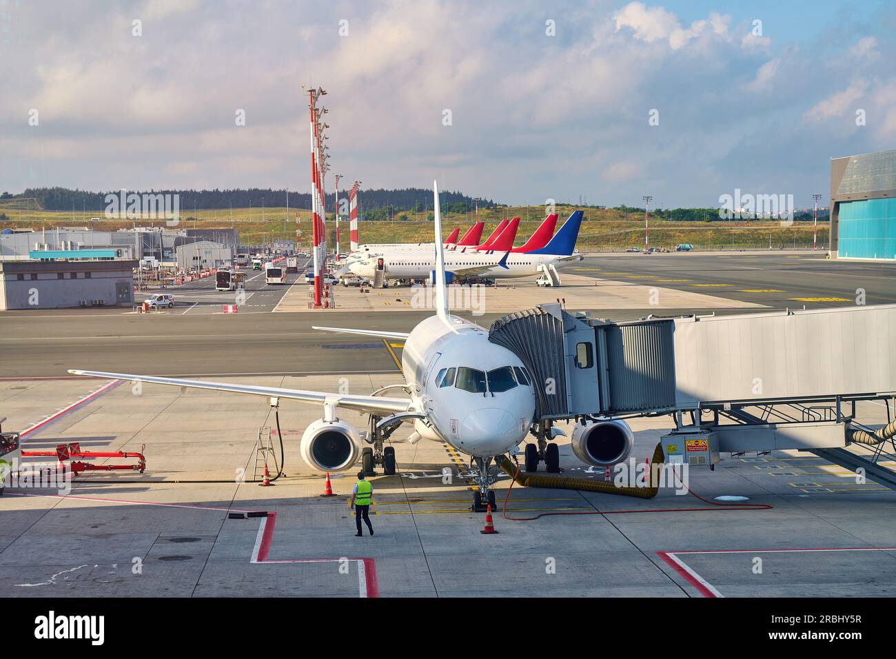 passenger plane is parked at the airport Stock Photo - Alamy