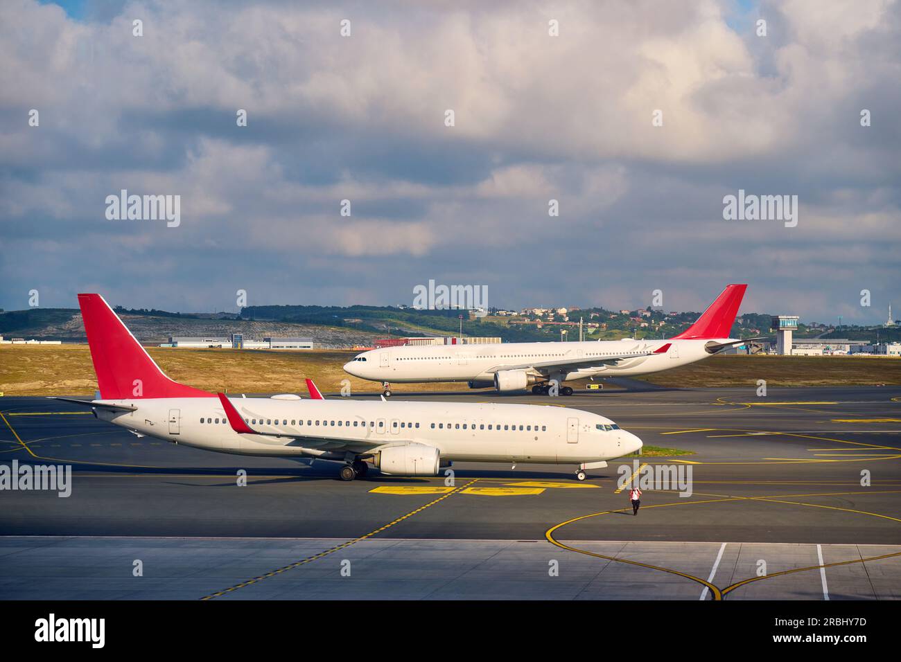 passenger plane is parked at the airport Stock Photo - Alamy