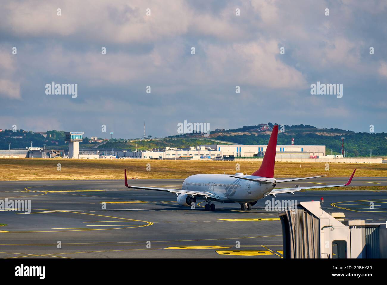 passenger plane is parked at the airport Stock Photo - Alamy