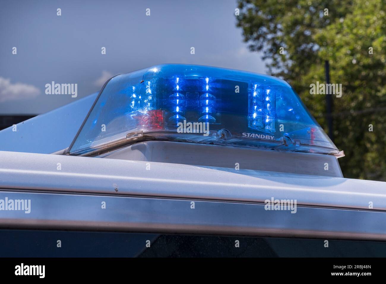 Blue light on a police car Stock Photo Alamy