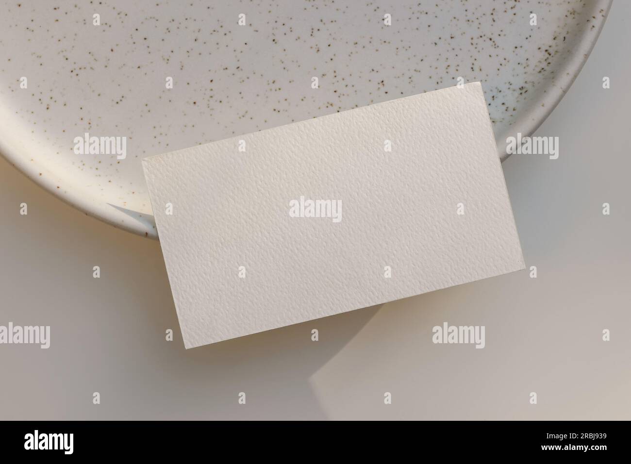 Speckled beige plate hires stock photography