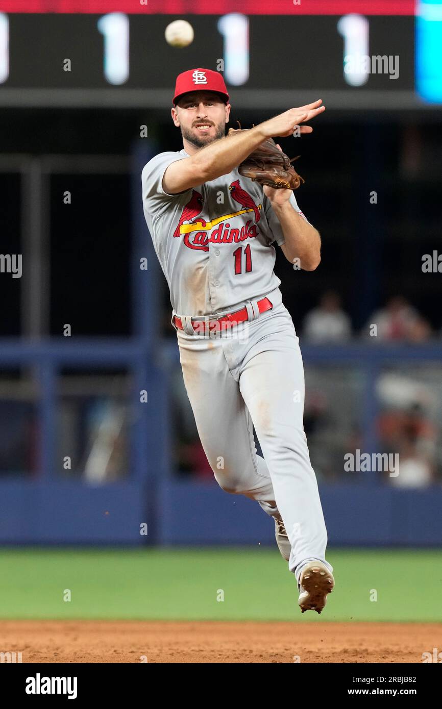 St. Louis Cardinals shortstop Paul DeJong (11) throws to first base on