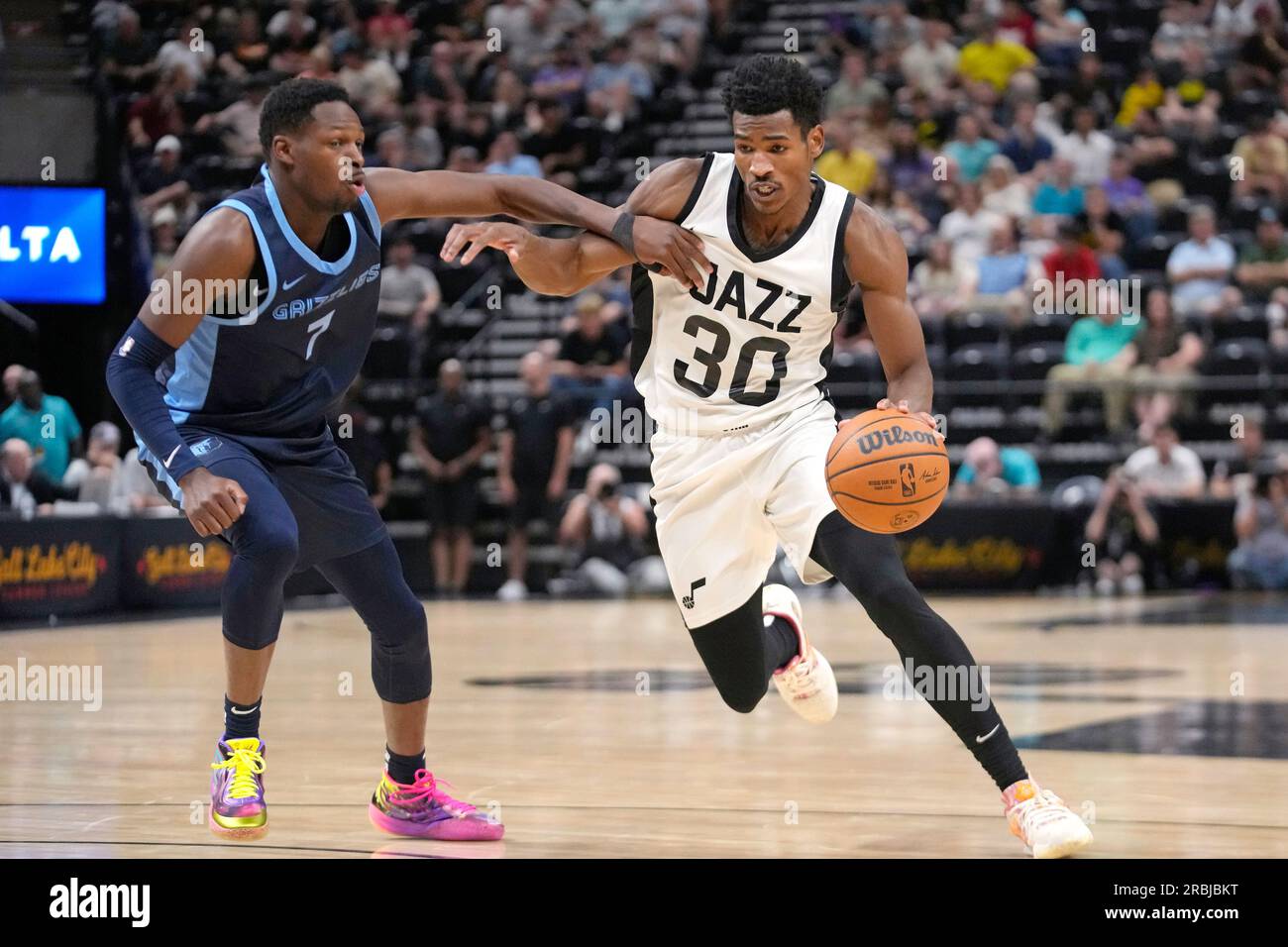 Utah Jazz guard Ochai Agbaji (30) drives as Memphis Grizzlies guard ...