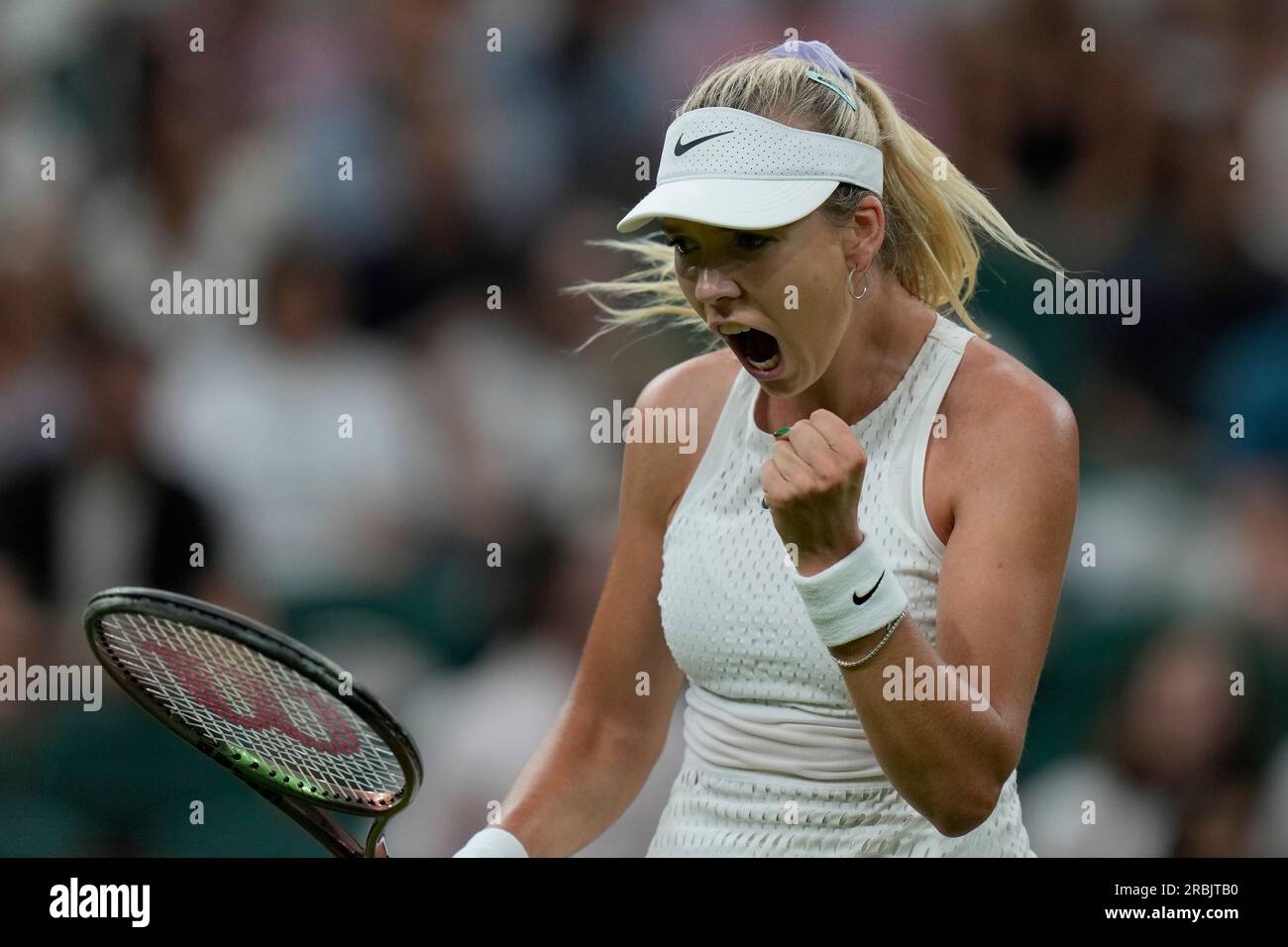 Britain's Katie Boulter celebrates winning a point against Kazakhstan's