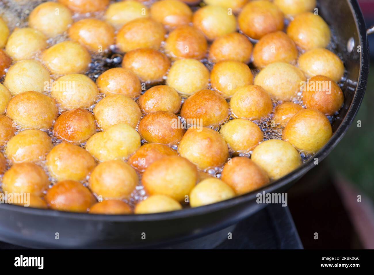 UAE, Dubai, Arabic sweet dough balls cooking Stock Photo - Alamy