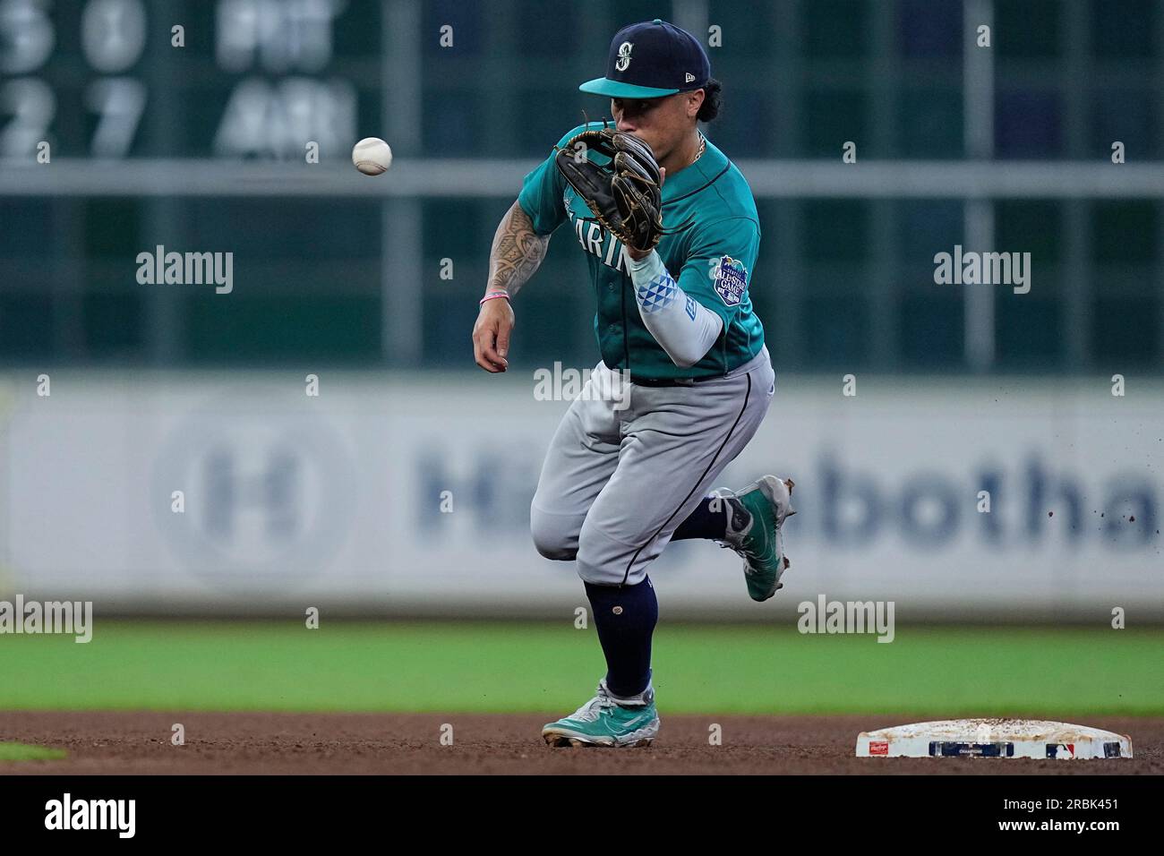 Seattle Mariners second baseman Kolten Wong runs out onto the field before  a baseball game against the St. Louis Cardinals, Sunday, April 23, 2023, in  Seattle. (AP Photo/Lindsey Wasson Stock Photo - Alamy
