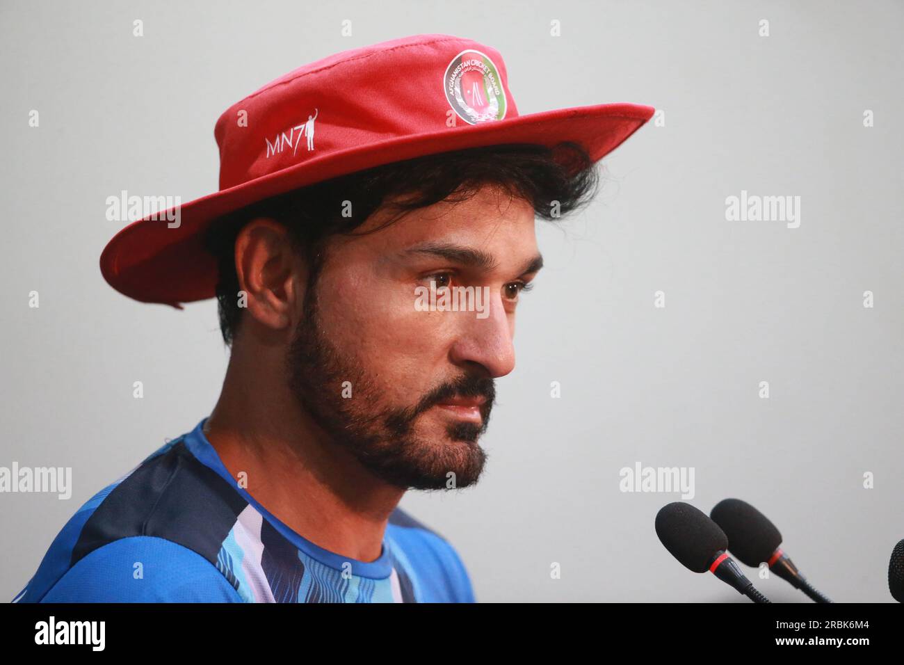 Afghanistan bowling coach Hamid Hasan attends a prematch press conference at the Zahur Ahmed