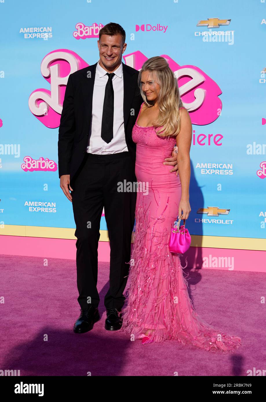 Rob Gronkowski, left, and Camille Kostek arrive at the premiere of