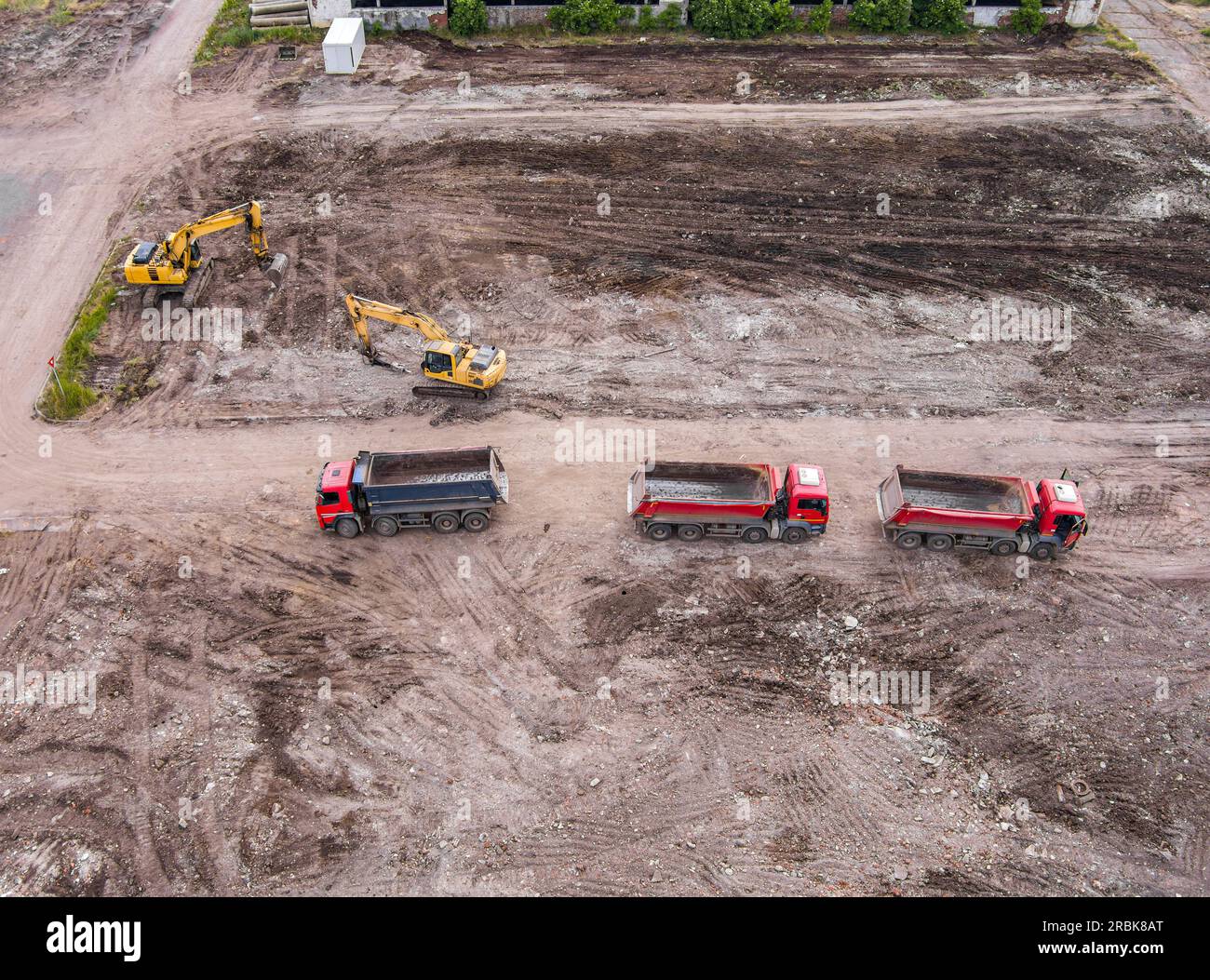 Aerial photo of an excavator working on a construction site Stock Photo ...