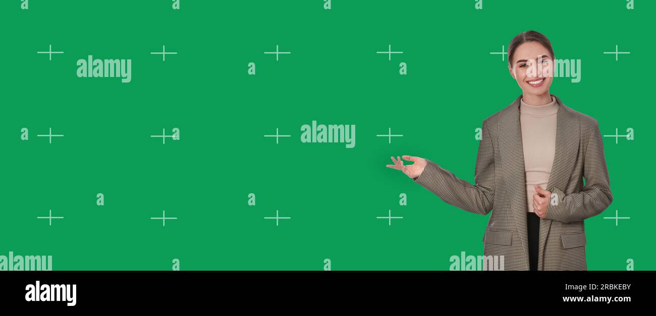Chroma key compositing. Broadcaster against green screen, banner design Stock Photo